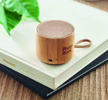 Logotrade promotional merchandise picture of: Round bamboo wireless speaker