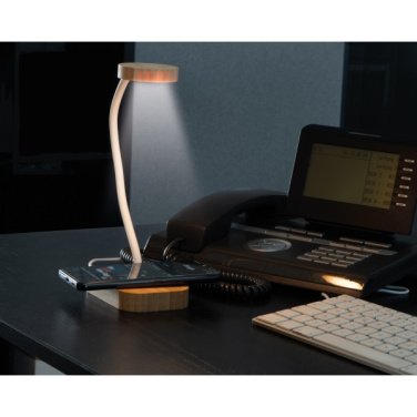 Logo trade reklaamkingitused foto: Juhtmeta laadijaga laualampTomsk